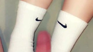 Footjob in Long Socks and Cums on Socks