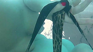 Underwater Lesbian Strap on Sex