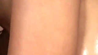 An oiled big ass ebony fucked hard from BBC on the couch