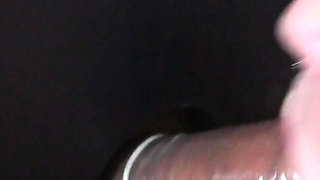 Girlfriend Sucks Condom off Stranger at Glory Hole