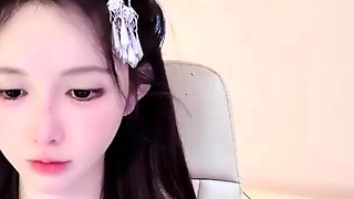 Japanese babe in schoolgirl uniform masturbates