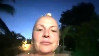 Blonde is flashing her big boobs in the outdoors