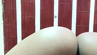 Big ass babe exposes her big boobs