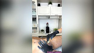 Deep bikini waxing for a client with a monster penis