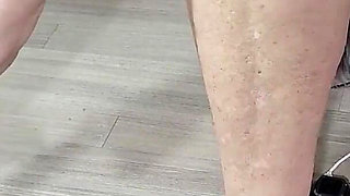 Blond Hottie Leggy Toe Tapping in Sexy Green Heels.