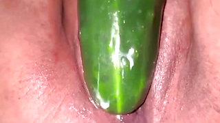 Eating a delicious cucumber in the morning
