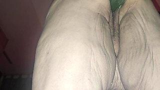 The cunt fucked with the cucumber