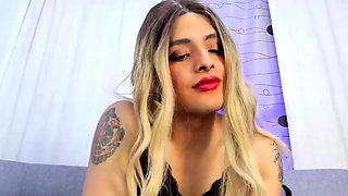 Tattood shemale tranny plays with ass during masturbation