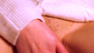 Young MILF masturbates her pussy with a vibrator