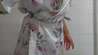 Step cleaning the bathroom on lingerie