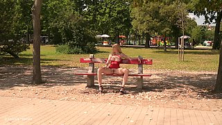 Amateur teen shows tits in public