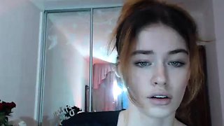 Amateur redhead poses and masturbates with toys