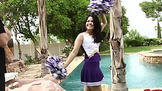 Provocative cheerleader Yhivi drops her uniform to ride a cock