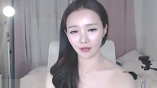 Horny Korean teases with her sexy body