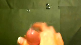 An explosive slow motion POV cumshot from a great reacharound handjob