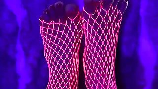 Pink neon fishnet on sexy small Asian feet with long toes