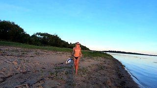 Russian Nudist on the River Shore