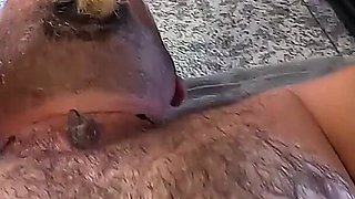 Husband Lying on His Back Trying Piss and Cum Through a Funnel