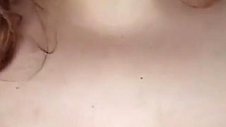 She gets horny by kneading her huge tits with oil until she stains her thong