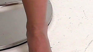 Lola’s Nylon Feet on the Barstool