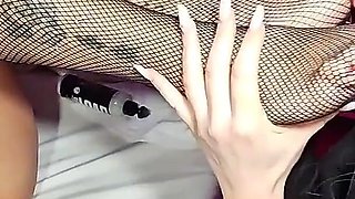 Hot Brunette Fisting Her Slave in a Swinger Club.