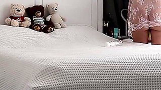 Stepmom Tidies the Bedroom. in Her Sheer White Robe