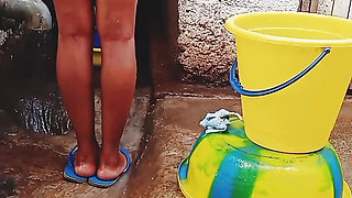 Outdoor bathing my pregnant girlfriend in dirty environment.