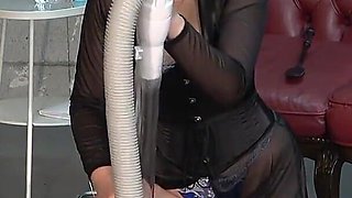 Mistress Fills a Bucket with Water, Makes Slave Lift the Bucket with His Dick, and Vacuums Slave's Dick to Make It Stronger