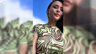 Exotic beauty flashing her perfect tight cunt outdoors