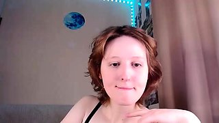 Amateur redhead poses and masturbates with toys