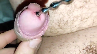 A Large Dilator in My Stepbrother's Cock