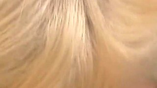 Charlize Danay swallows in front of a camera