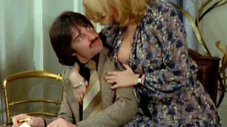 Brigitte Lahaie and Kathy Stewart Suck the Boss Under the Desk