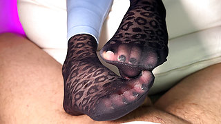 Nylon footjob in leopard nylon socks