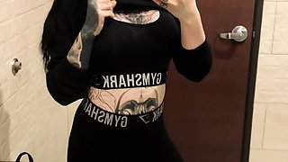 Tattooed teen reveals her fabulous body in a public toilet