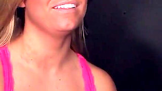 Jessica Marie kneels down and is ready to suck huge cock from gloryhole