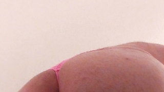pink panties g-string on a big white ass.
