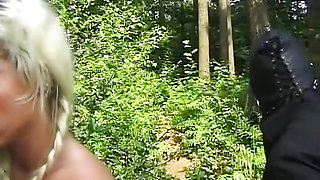 Dirty blonde German slut tied up and fucked in the woods