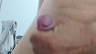 Horny guy masturbating over the toy