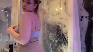 A whore slips into the toilet to use a remote-controlled dildo vibrator