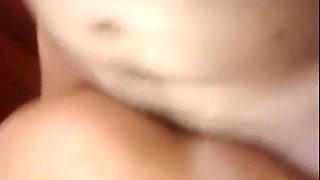 Girl uses her mouth to put a condom on a friend's cock and fucks him, while her bf tapes it.