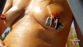 Nippleringlover Horny Milf Masturbating Outdoors In Pool Inserting Huge Screws In Extreme Stretched Pierced Nipples