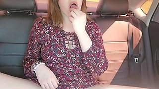 She enjoys her toys in the car while her husband is away at work