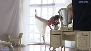 Stunning nude ballerina Annett A warms up for a shoot and strikes poses without a bra