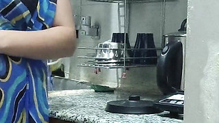 Indian Stepmom Watches and Enters Her Stepson's Kitchen to Fuck Him.