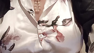 Beautiful breasts with satin blouse..