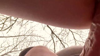 Busty blonde baddie undresses and works lover's cock in the woods
