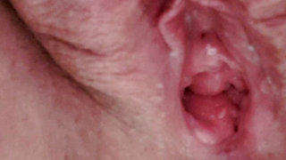 Pissing in close up with open pussy