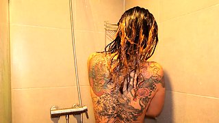 Thai teen showering a taking a big cock
