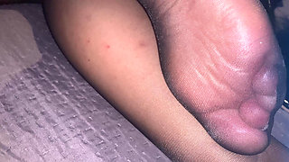Feet in black pantyhose to jerk off and cum